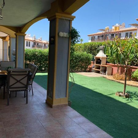 Apartamento con jardín privado y acceso a piscina Huelva Exterior foto